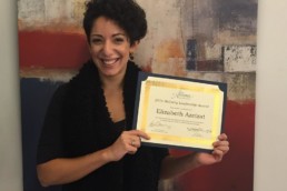 Fearless cultural exchange employee displays her McCarry Leadership Award.