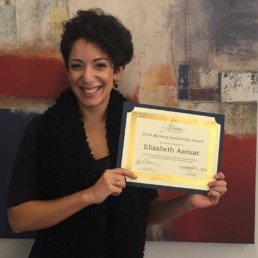 Fearless cultural exchange employee displays her McCarry Leadership Award.